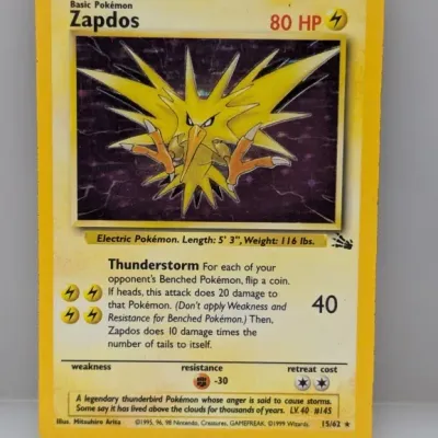 1999 Pokémon Fossil set Zapdos holographic trading card, number 15/62, illustrated by Mitsuhiro Arita.