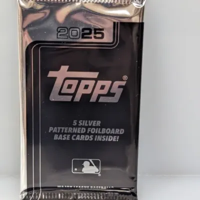 Sealed 2025 Topps Major League Baseball silver patterned foilboard base card pack in unopened condition.