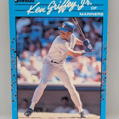 1990 Donruss #365 Ken Griffey Jr. baseball trading card featuring his signature batting stance with the Seattle Mariners.
