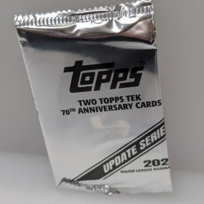 Sealed silver foil promo pack of 2021 Topps Update Series Major League Baseball cards, featuring two Topps Tek 70th Anniversary cards.