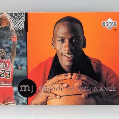 Michael Jordan Upper Deck "Decade of Dominance" trading card featuring a portrait and in-game photo of the Chicago Bulls star.