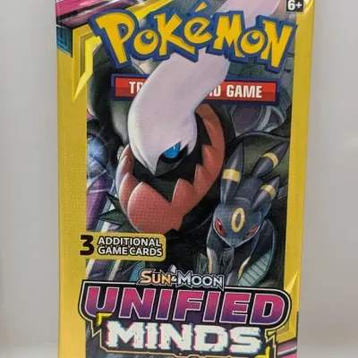 Sealed Pokémon Sun & Moon Unified Minds 3-card booster pack featuring Darkrai and Umbreon artwork.