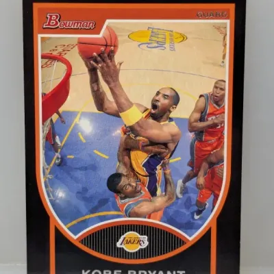 2009-10 Bowman Kobe Bryant basketball trading card #17, featuring an in-game photo of Bryant driving to the basket for the Los Angeles...