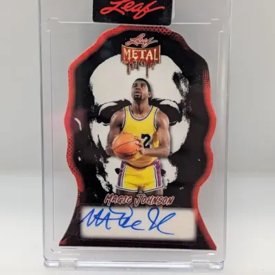 Leaf Metal Magic Johnson autographed die-cut trading card housed in a clear protective display case.