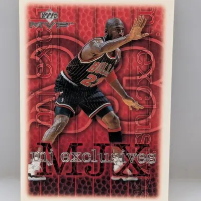 1999-00 Upper Deck MVP MJ Exclusives Michael Jordan basketball trading card #M1. The card features a red patterned background and silver...