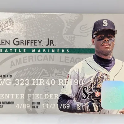 1995 Studio Ken Griffey, Jr. Seattle Mariners baseball trading card featuring 1994 stats and a hologram emblem.