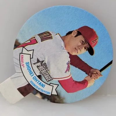 Topps Heritage Shohei Ohtani circular baseball tab insert card featuring him in a Los Angeles Angels uniform.