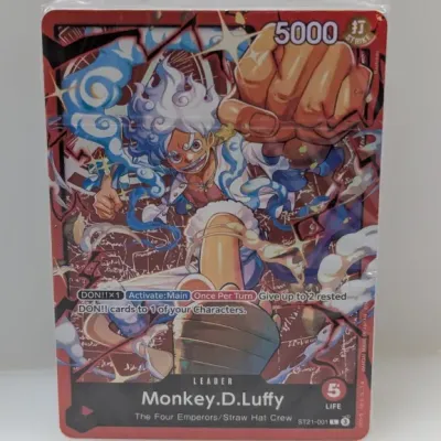 Sealed One Piece Card Game starter deck ST21-001 featuring Monkey D. Luffy Leader card in original plastic wrapping.
