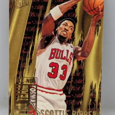 1996-97 Fleer Ultra Scottie Pippen All-NBA 1st Team basketball trading card, featuring gold foil detailing.