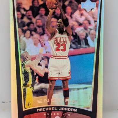 1998-99 Upper Deck Encore Michael Jordan trading card featuring a holographic border and inline design elements.