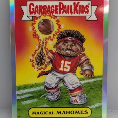 Garbage Pail Kids "Magical Mahomes" trading card with a reflective holographic border, featuring a caricature of Patrick Mahomes.