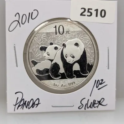 2010 Chinese Silver Panda 10 Yuan coin, 1 oz .999 fine silver, housed in a cardboard flip holder.