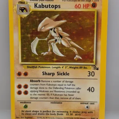 1999 Pokémon Fossil set holo Kabutops trading card, #9/62, illustrated by Ken Sugimori.