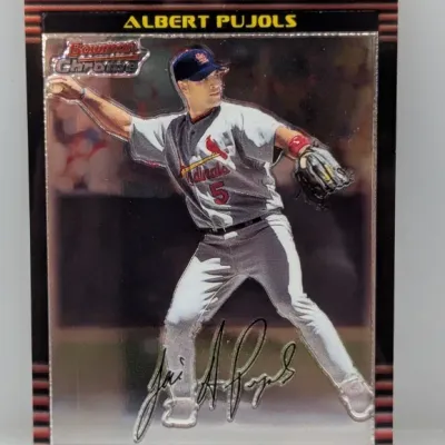 2001 Bowman Chrome Albert Pujols rookie baseball card with a red border and facsimile autograph.