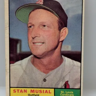 Vintage 1961 Topps Stan Musial #290 baseball card featuring the St. Louis Cardinals outfielder, showing light corner wear and off-center...