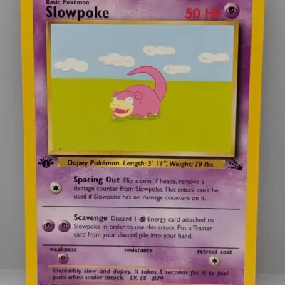 1999 Pokémon Fossil set 1st Edition Slowpoke trading card #55/62 in clean condition.