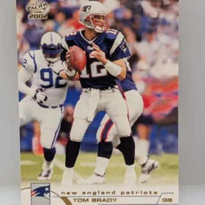 2002 Pacific Tom Brady New England Patriots football trading card in good condition.