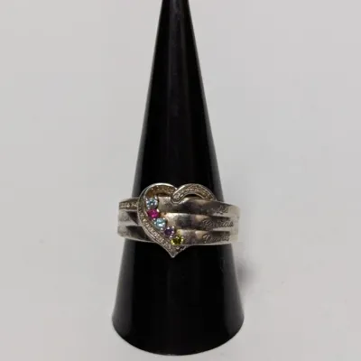 Personalized sterling silver mother's ring featuring a heart motif inset with multi-color birthstones and engraved names along the...