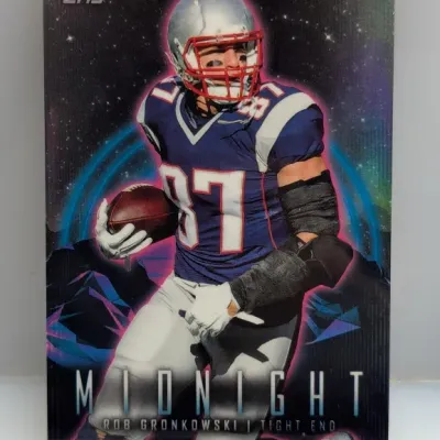 Topps Midnight Rob Gronkowski football trading card featuring a vibrant galaxy and synthwave-style background design.