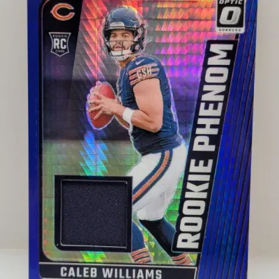 Panini Donruss Optic Rookie Phenom Caleb Williams trading card with a dark fabric jersey relic swatch.