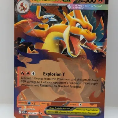 Ultra Rare Mega Charizard Y ex holographic Pokémon trading card from the Scarlet & Violet series, numbered 022/217.