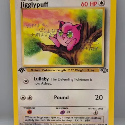 1999 Pokémon Jungle set 1st Edition Jigglypuff trading card #54/64, illustrated by Kagemaru Himeno.
