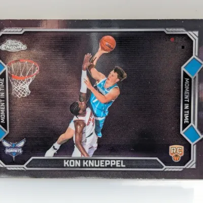 Topps Chrome 'Moment in Time' Kon Knueppel rookie basketball trading card in good condition.