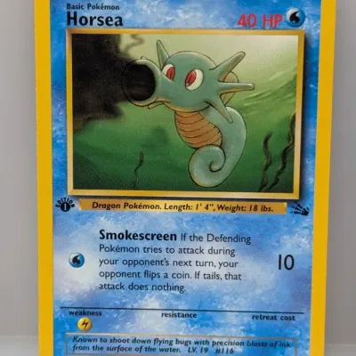 1st Edition Horsea Pokémon card from the 1999 Fossil expansion set (#49/62), illustrated by Mitsuhiro Arita.