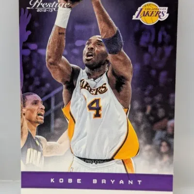 2012-13 Panini Prestige Kobe Bryant #24 trading card featuring the Los Angeles Lakers, in clean condition.
