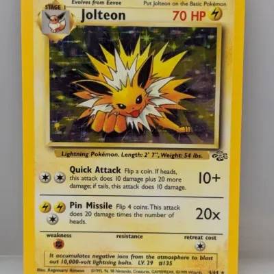 Vintage 1999 Pokémon Jungle Set Jolteon holographic trading card (4/64), illustrated by Kagemaru Himeno.