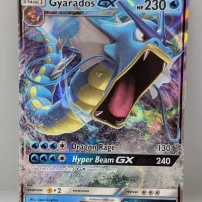 Gyarados GX Pokémon trading card, SM212 promo edition from 2019, featuring full-art holographic illustration.