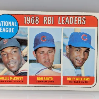 1969 Topps #5 National League RBI Leaders baseball card featuring Willie McCovey, Ron Santo, and Billy Williams.