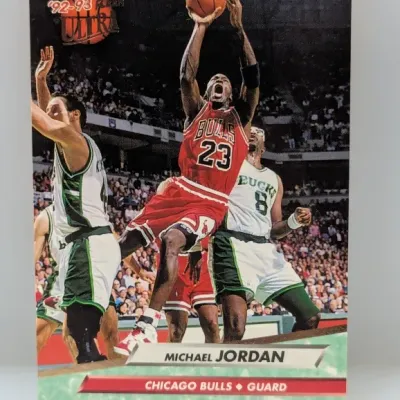 1992-93 Fleer Ultra Michael Jordan #27 trading card featuring a action shot of him shooting over Milwaukee Bucks players.