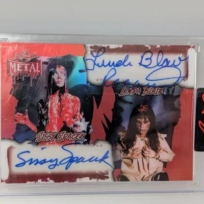 Leaf Metal Pop Century dual autograph trading card featuring Sissy Spacek from Carrie and Linda Blair from The Exorcist, encased in a...