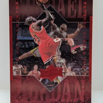 Upper Deck 1999 Michael Jordan 'Athlete of the Century' Playoff Performances trading card featuring red foil accents.