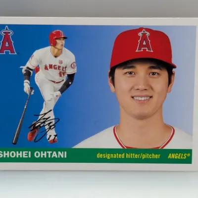 Topps-style Shohei Ohtani Los Angeles Angels baseball card with facsimile signature, featuring vintage 1965-style design graphics.