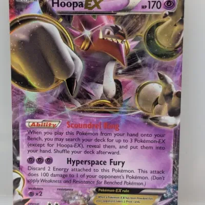 Hoopa-EX full-art Black Star Promo Pokémon TCG card (XY71), copyright 2015, featuring the Scoundrel Ring ability and Hyperspace Fury attack.