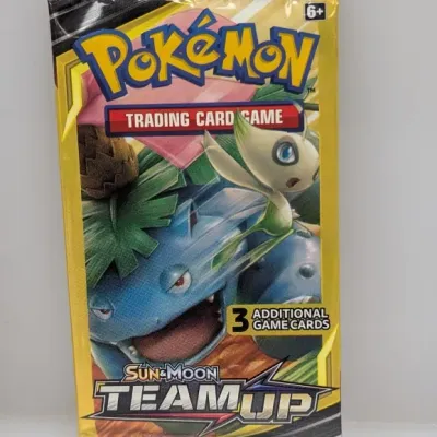 Sealed Pokémon Sun & Moon Team Up booster pack featuring Venusaur and Celebi artwork, containing 3 additional game cards.