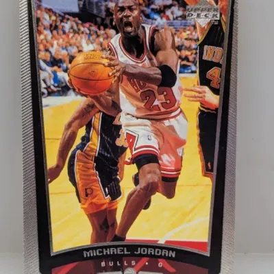 Upper Deck Michael Jordan Chicago Bulls basketball trading card featuring an action shot with a silver foil border.