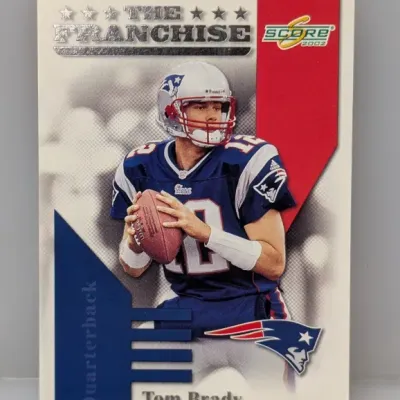 2002 Score 'The Franchise' Tom Brady football card, featuring him in his New England Patriots uniform.