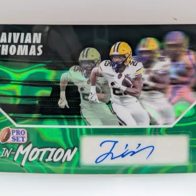 Pro Set In-Motion autographed Jaivian Thomas football trading card featuring a vibrant green refractor background.