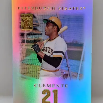 Topps Tribute Roberto Clemente #21 baseball trading card featuring a rainbow foil finish.