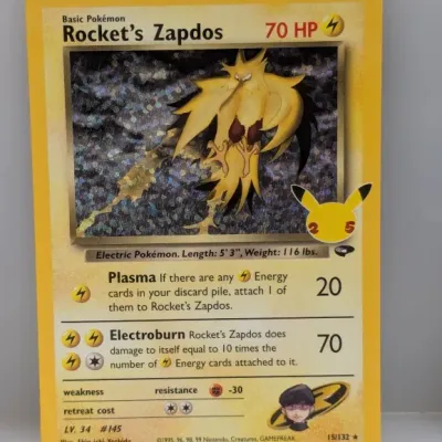 Pokémon Rocket's Zapdos holographic trading card from the 25th Anniversary Celebrations set.