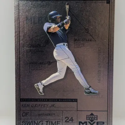 1999 Upper Deck MVP Silver Script Ken Griffey Jr. Swing Time insert trading card featuring a blueprint-style design.
