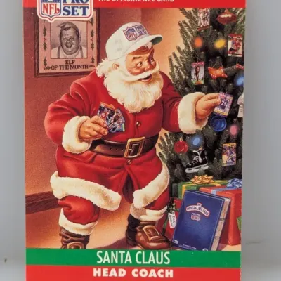 1989 Pro Set Santa Claus #FP2 special insert trading card featuring illustration of Santa decorating a Christmas tree.