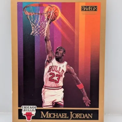 1990-91 SkyBox Michael Jordan Chicago Bulls #41 trading card, featuring gold borders and colorful rainbow background artwork.