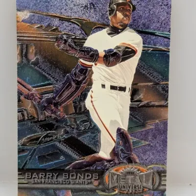 1997 Metal Universe Barry Bonds baseball card #12, featuring a textured metallic foil finish.