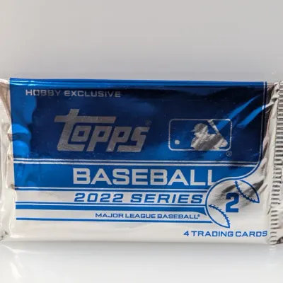 Sealed pack of 2022 Topps Series 2 Major League Baseball trading cards, hobby exclusive edition containing four cards.