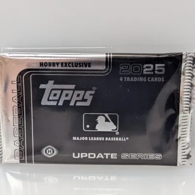 Sealed pack of 2025 Topps Baseball Update Series hobby exclusive trading cards containing 4 cards.