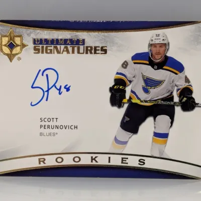 Upper Deck Ultimate Signatures Scott Perunovich autographed rookie hockey trading card featuring the St. Louis Blues player.